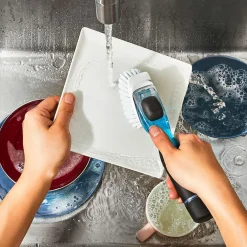 Cepillo con dispensador para limpiar los platos OXO