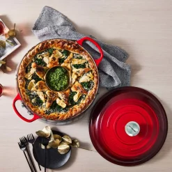 Cocotte redonda baja Signature Le Creuset