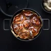 Conjunto de cocotte y sartén de hierro fundido Flavour WMF