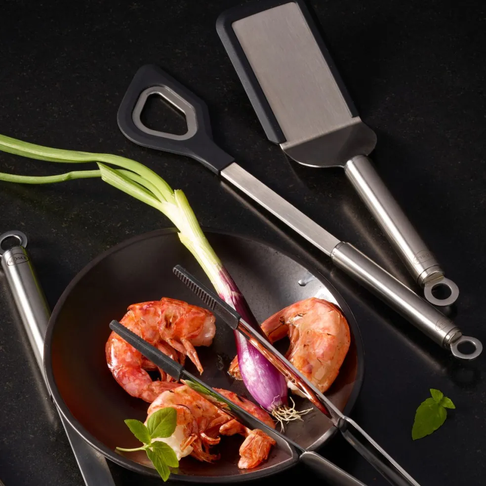 Cuchara espátula con agujero de inox con bordes de silicona Rösle