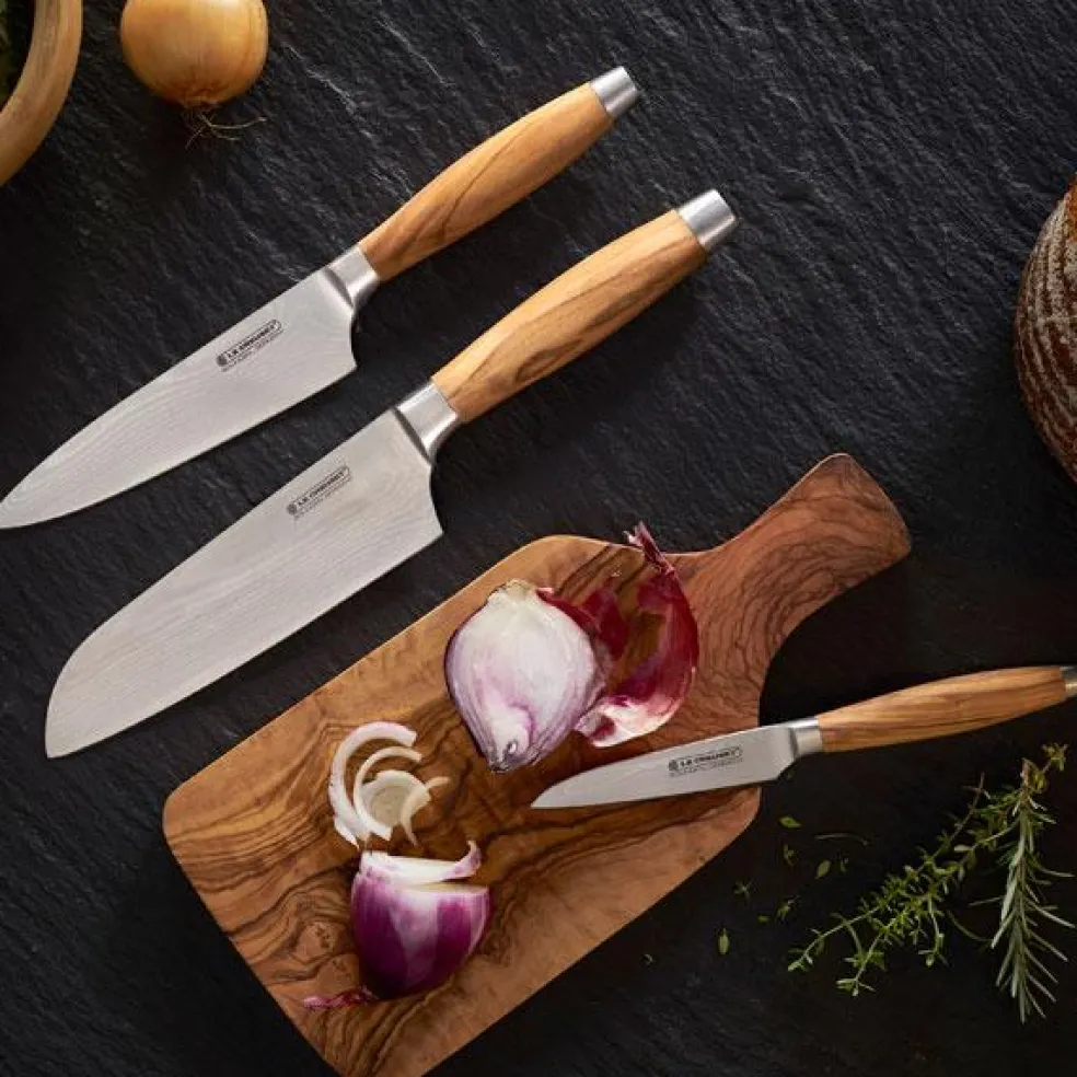 Cuchillos Le Creuset de acero damasco con mango de madera de olivo