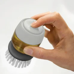 Juego de dispensador de jabón y cepillo Palm Scrub Joseph Joseph