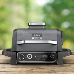 Parrilla eléctrica de exterior con ahumador y freidora de aire Ninja®