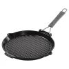 Parrilla redonda de hierro fundido con mango plegable Staub